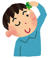 目薬をさす少年