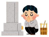 墓参りをする男性
