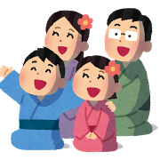 花火鑑賞する家族